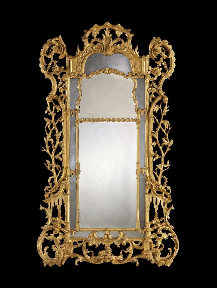AN IRISH GEORGE III GILTWOOD BORDER GLASS PIER MIRROR